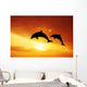 Dolphins at sunset Wall Mural