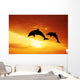 Dolphins at sunset Wall Mural