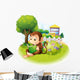 A monkey reading a book near the plants with flowers Wall Decal