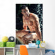 Muscular Wet Bodybuilder Sitting on Railing Wall Mural