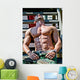 Muscular Bodybuilder Laying Wood