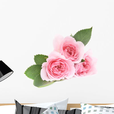 Three Pink Roses Wall Decal shown on a wall