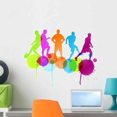 Soccer Football Player Silhouette Wall Decal shown on a wall