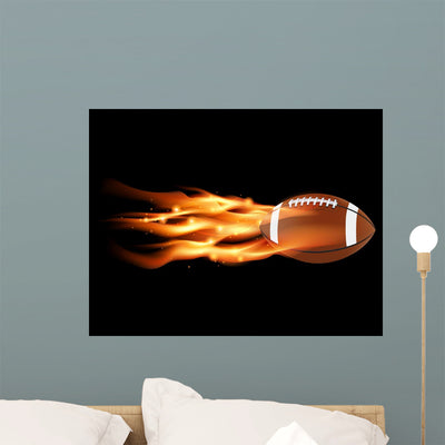 Flaming Football Wall Decal shown on a wall
