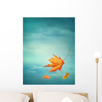 Autumn Falling Leaves Wall Decal shown on a wall