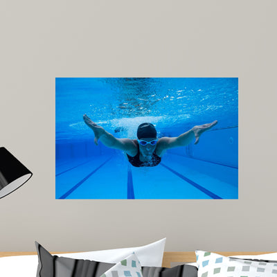 Swimming Underwater Wall Decal shown on a wall