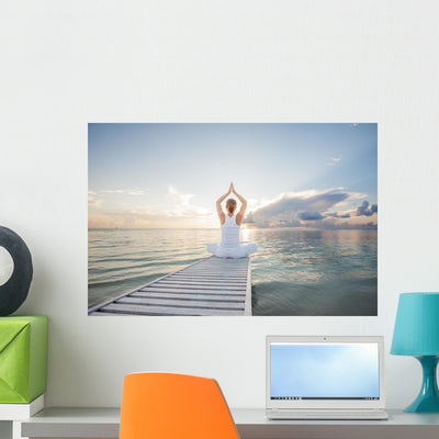 Caucasian Woman Practicing Yoga Wall Decal shown on a wall