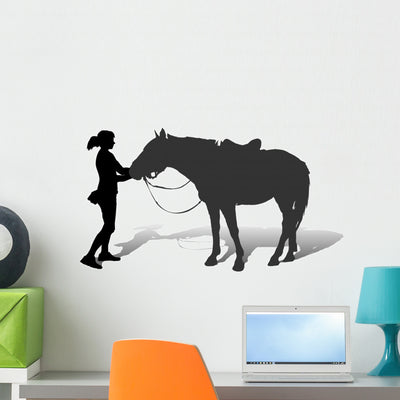 Vector Silhouette Girl and Wall Decal shown on a wall