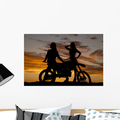 Silhouette Two Women Stand Wall Decal shown on a wall