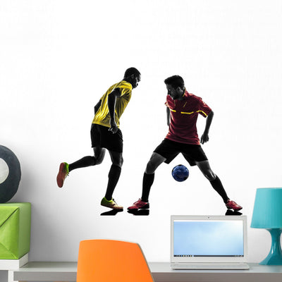 Two Men Soccer Player Wall Decal shown on a wall