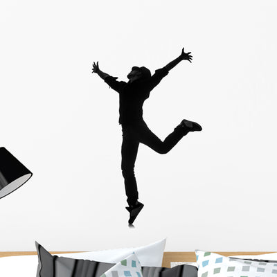 Silhouette Male Dancer White Wall Decal shown on a wall