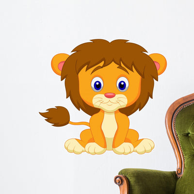 Baby Lion Cartoon Sitting Wall Decal shown on a wall