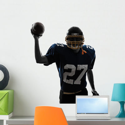 Quarterback American Throwing Football Wall Decal shown on a wall