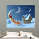 Christmas night scene - Santa Claus rides reindeer sleigh Wall Mural