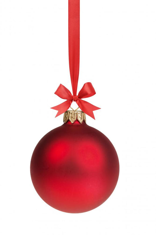 red christmas ball hanging on ribbon with bow 