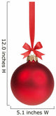 red christmas ball hanging on ribbon with bow 