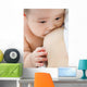 Mother breast feeding baby Wall Mural