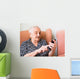 Old lady using a smartphone Wall Mural