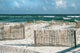 Beautiful Florida Beach with Sand Fences and Turquoise Ocean 