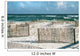 Beautiful Florida Beach with Sand Fences and Turquoise Ocean 