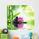 Background spa - orchids black stones and bamboo on water 