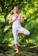 Woman Practacing Yoga in Nature 