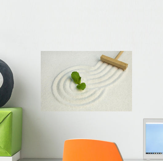 Green leaf on raked white sand of a zen garden Wall Mural