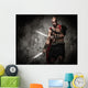 Wounded gladiator with two swords covered in blood 