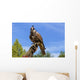 Falcon perched on its trainers hand Wall Mural