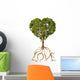 Tree with foliage with the shape of a heart and roots as text Lo 