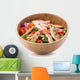 Grilled chicken salad in wooden bowl isolated on white Wall Decal