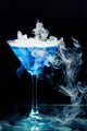 Blue Cocktail With Splash and Ice Vapor 
