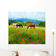 There horses grazing grass Wall Mural