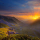 Sunrise Over a Mountain Valley 
