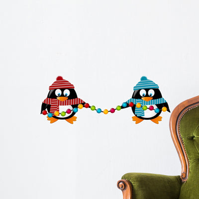Cute Penguins with Light Wall Decal shown on a wall