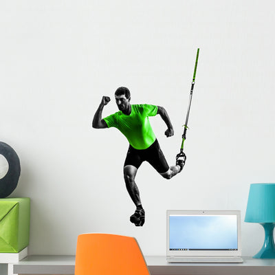 Man Exercising Suspension Training shown on a wall