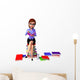 Young girl sitting on the pile of books Wall Decal