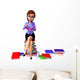 Young girl sitting on the pile of books Wall Decal