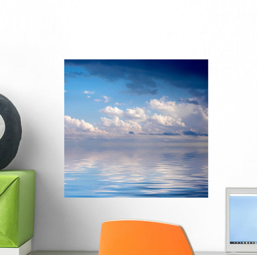 Blue dramatic sky over water Wall Mural
