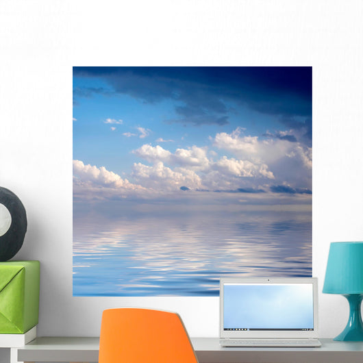 Blue dramatic sky over water Wall Mural