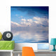 Blue dramatic sky over water Wall Mural