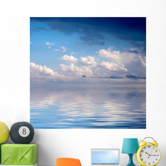 Blue dramatic sky over water Wall Mural