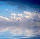 Blue dramatic sky over water Wall Mural