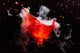 Red Cocktail With Splash and Ice Vapor 
