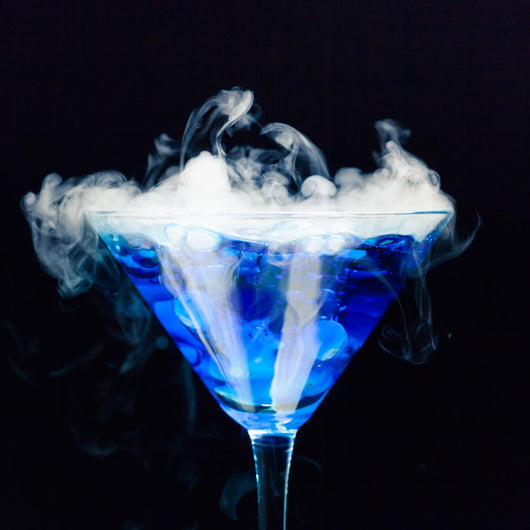 Blue Cocktail With Splash and Ice Vapor 