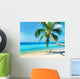Green tree on white sand beach Wall Mural
