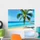 Green tree on white sand beach Wall Mural