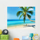 Green tree on white sand beach Wall Mural