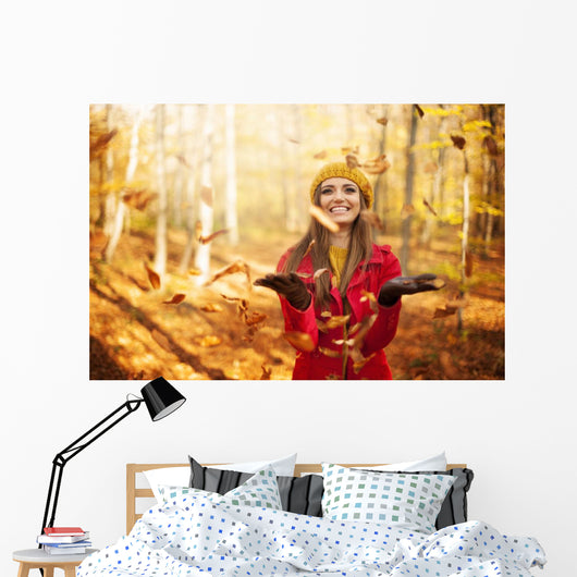 Happy Woman Throwing Leaves Wall Decal