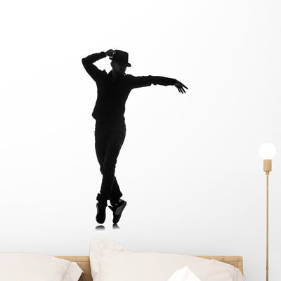 Male Dancer Silhouette Wall Decal shown on a wall